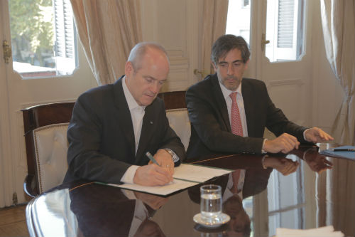 Michael Evans y Juan Pablo Trípodi_firma1